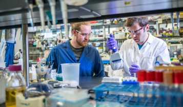 two man inside laboratory